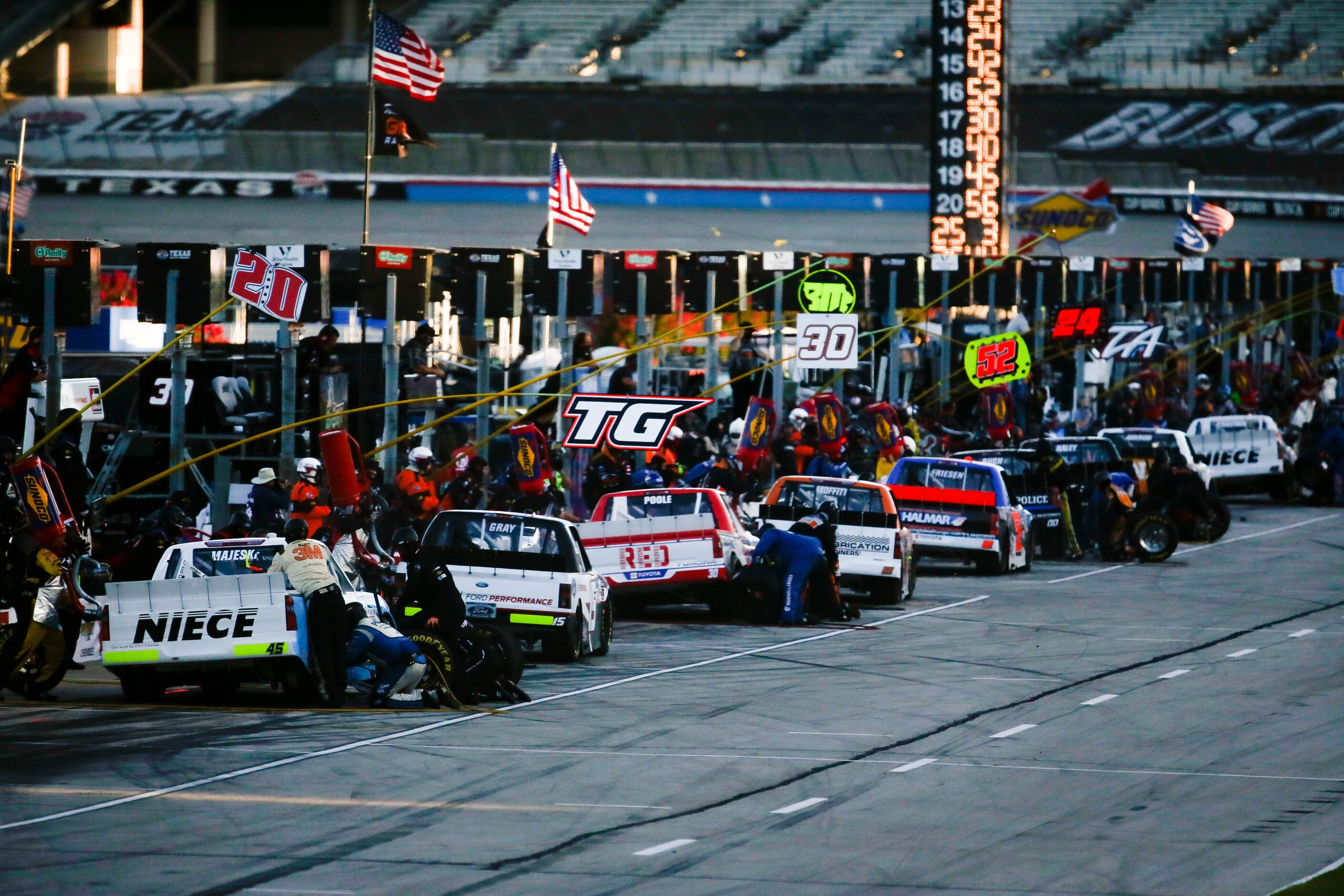 Drivers in Pit Road during the Vankor 350 NASCAR Gander RV & Outdoors Truck Series race on...