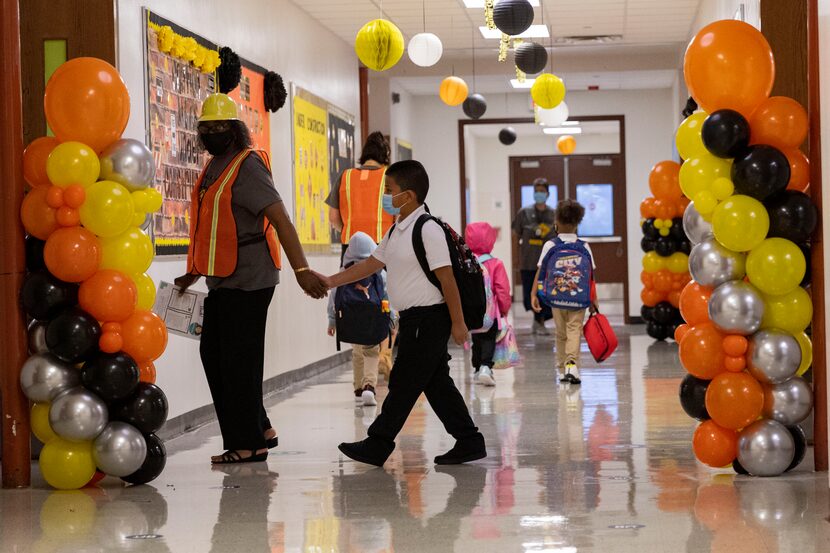 Students and teachers during the first day of school on Aug. 2, 2021, at H.I. Holland...