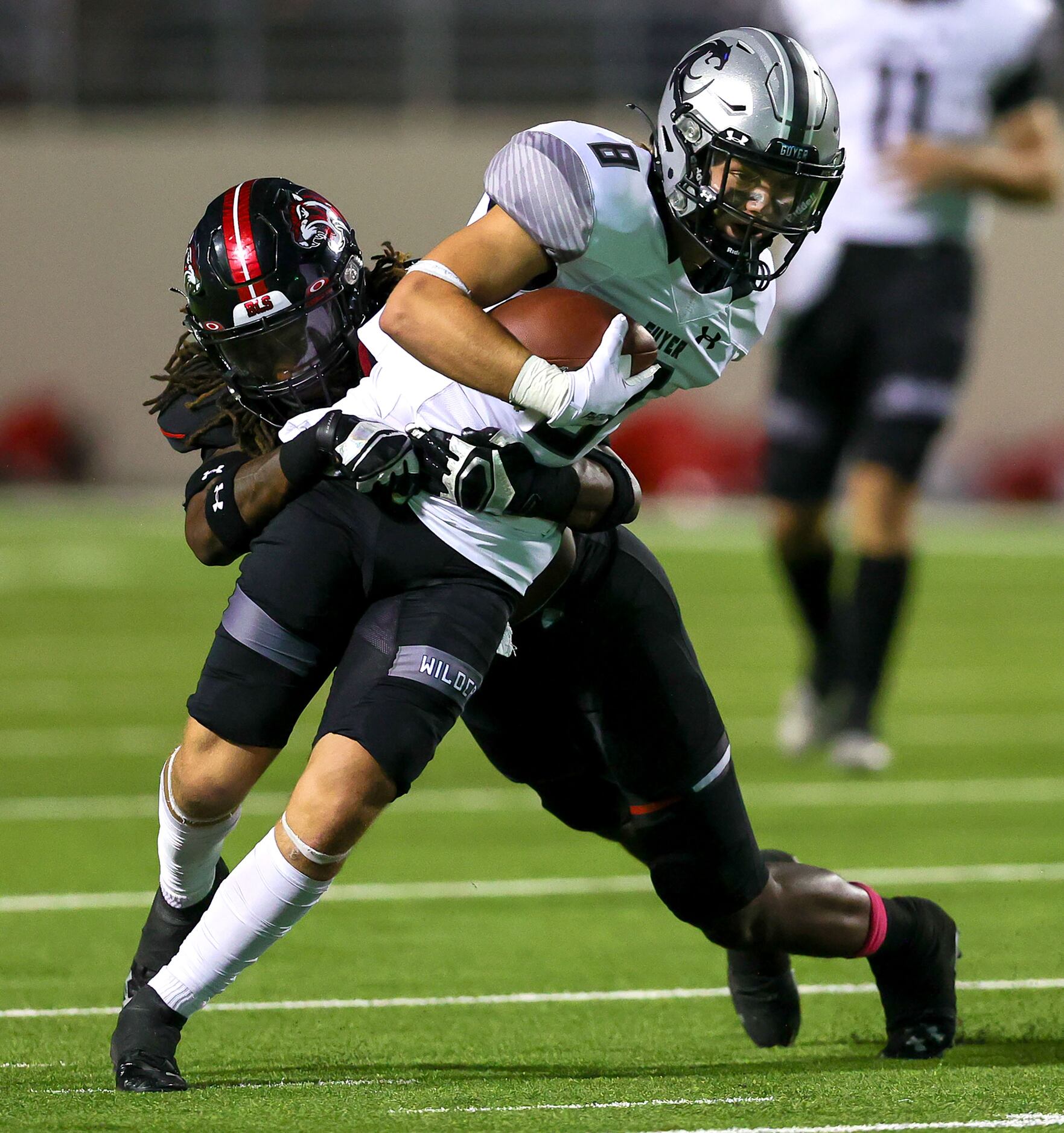 Denton Guyer wide receiver Sutton Lee (8) comes up with a reception against Denton Braswell...
