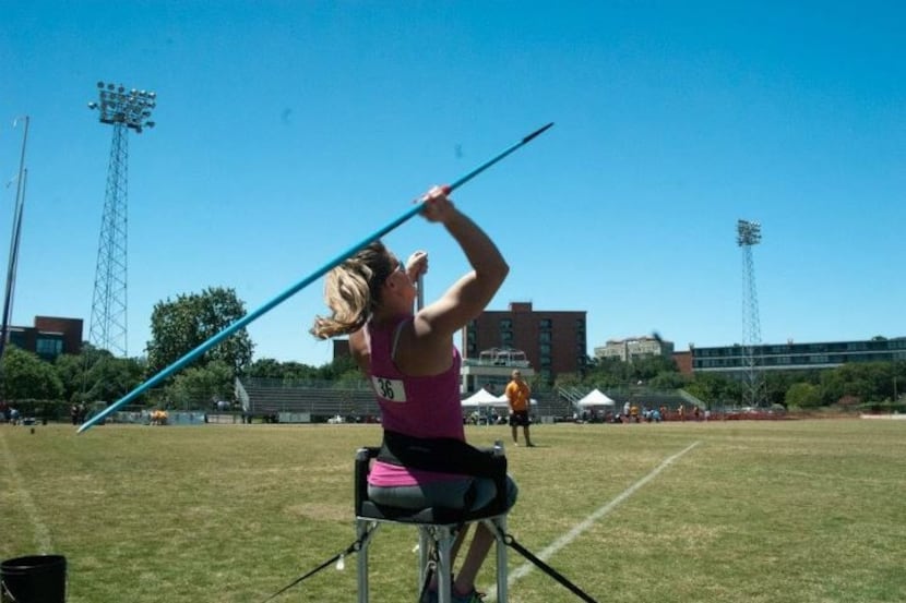 Amy Simmons competes in the javelin throw.