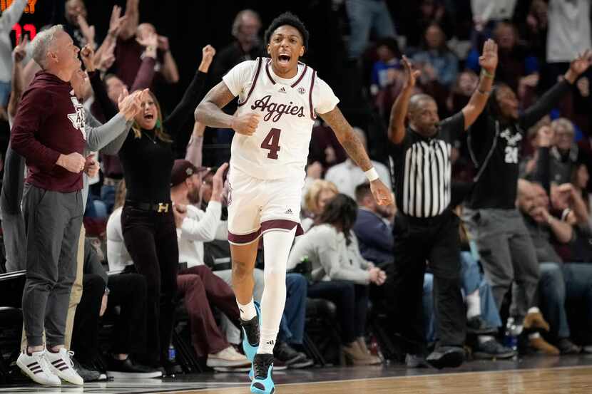 Texas A&M guard Wade Taylor IV (4) reacts after making a 3-point basket against Kentucky...