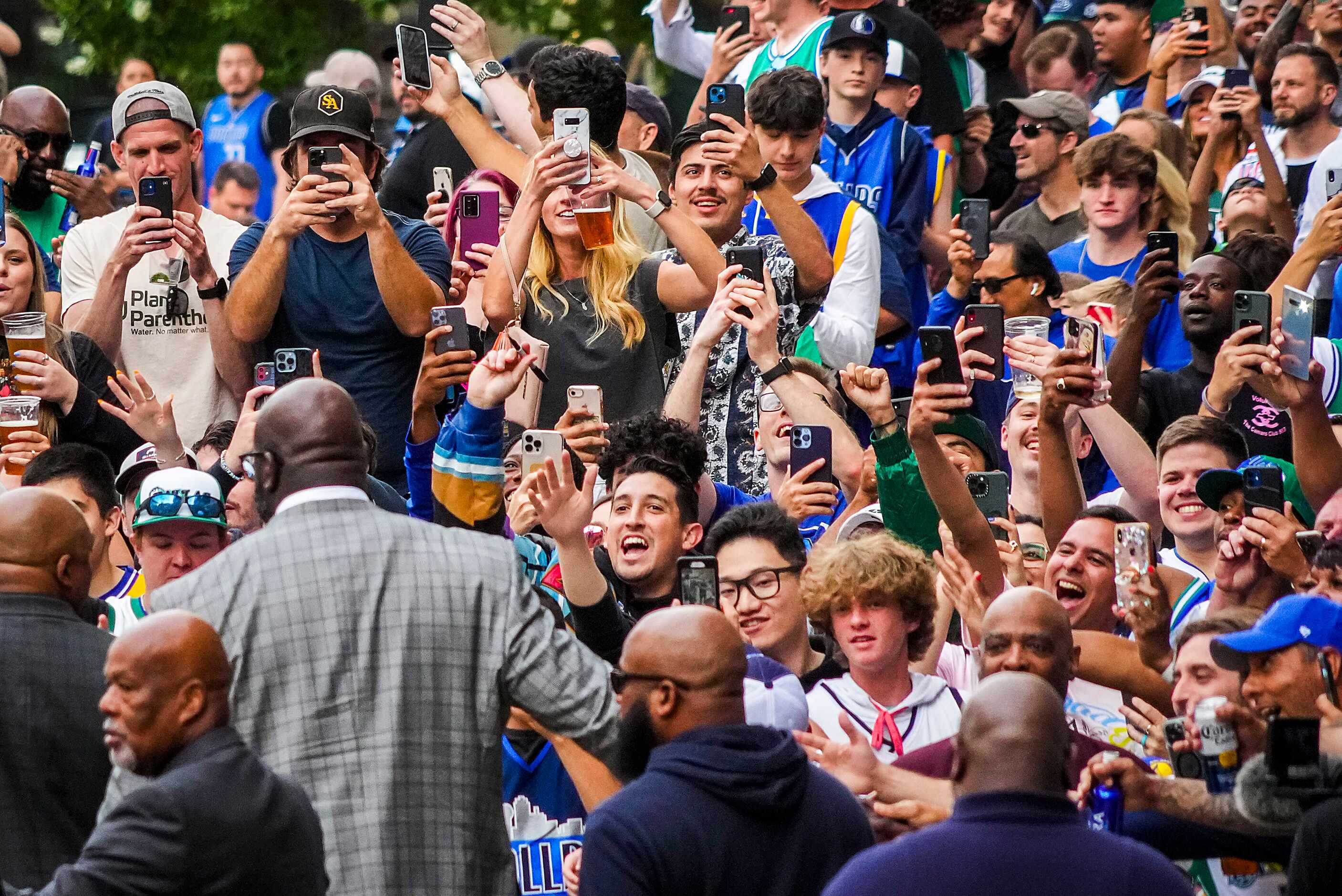 Fans cheer Shaquille O'Neal as he walks to the set of the TNT Tip-Off show before Game 3 of...