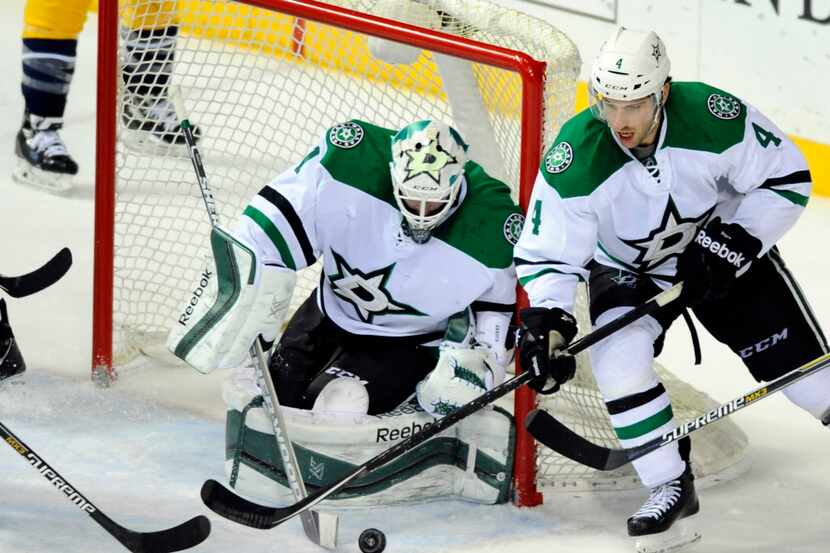 Apr 4, 2015; Nashville, TN, USA; Dallas Stars goalie Jhonas Enroth (1) makes a save during...