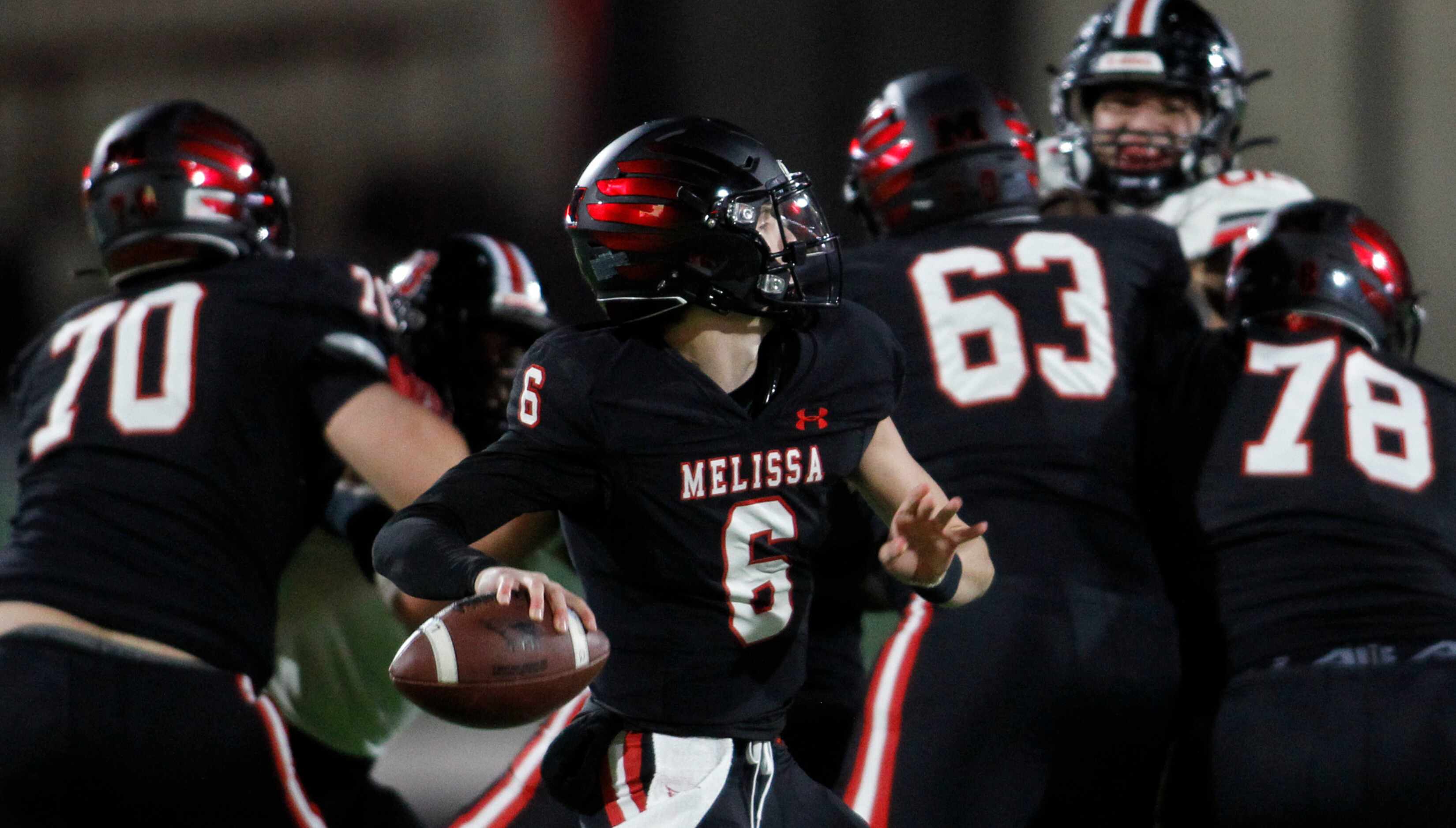 Melissa quarterback Trever Ham (6) launches a pass downfield during first half action...