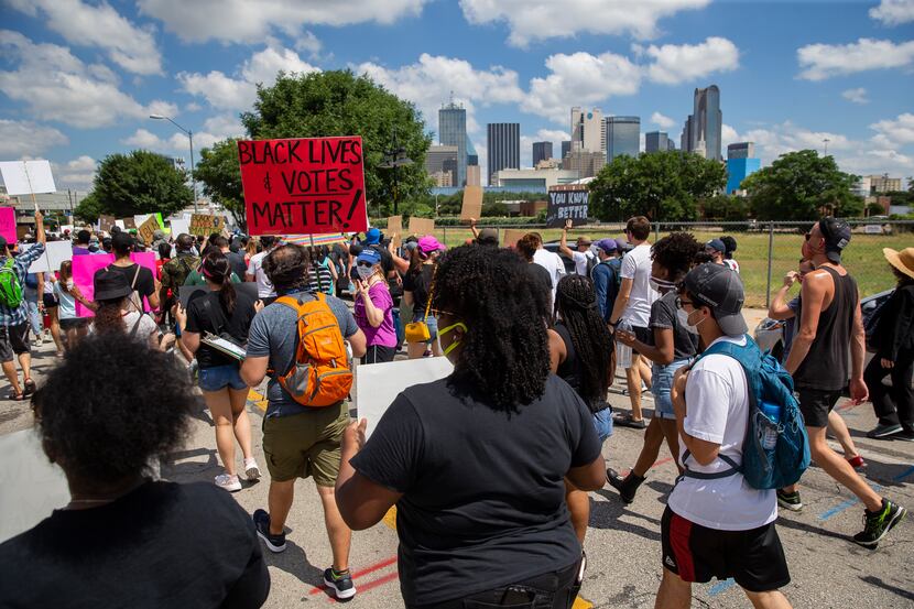 Protesters marched toward downtown Dallas during one of dozens of demonstrations against...