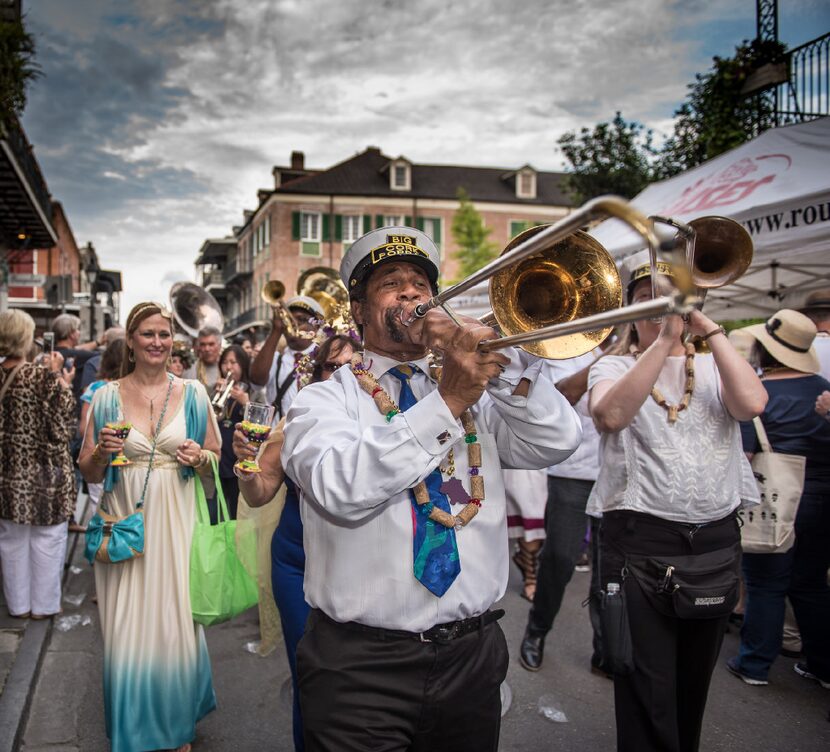 On the Royal Street Stroll in New Orleans' French Quarter, a band from Krewe of Cork plays....