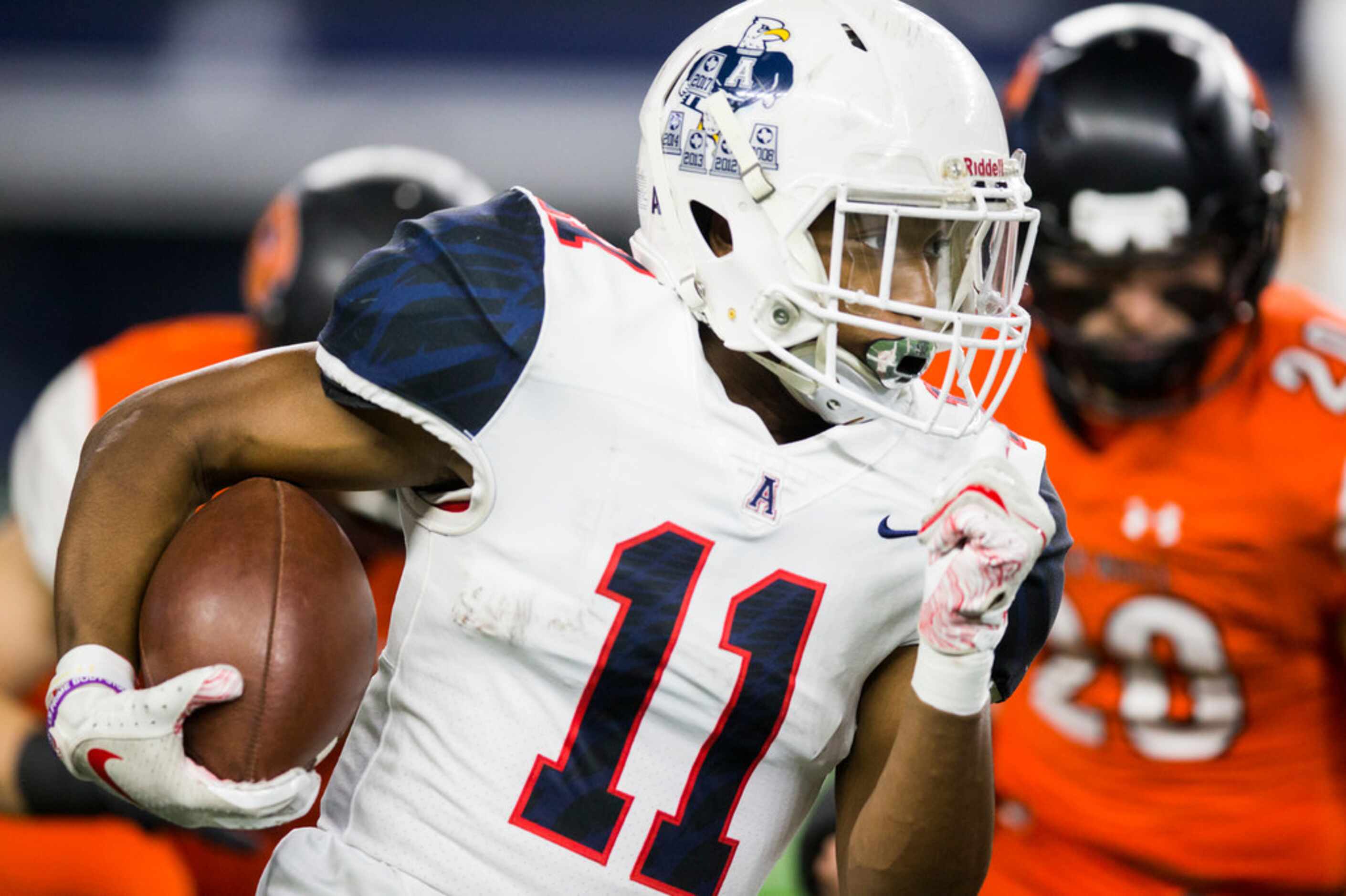 Allen running back Jordan Johnson (11) runs the ball to the end zone for a touchdown during...