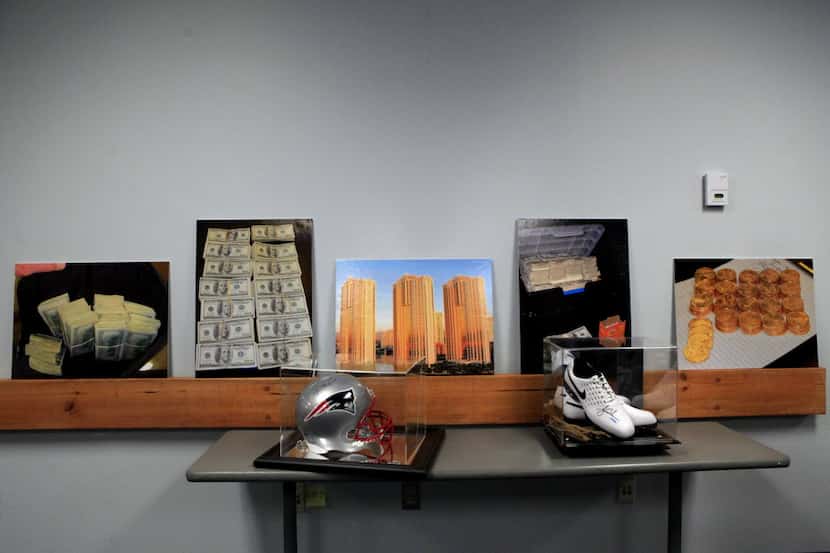 Some of the memorabilia seized during the break-up of a major sports gambling ring run out...