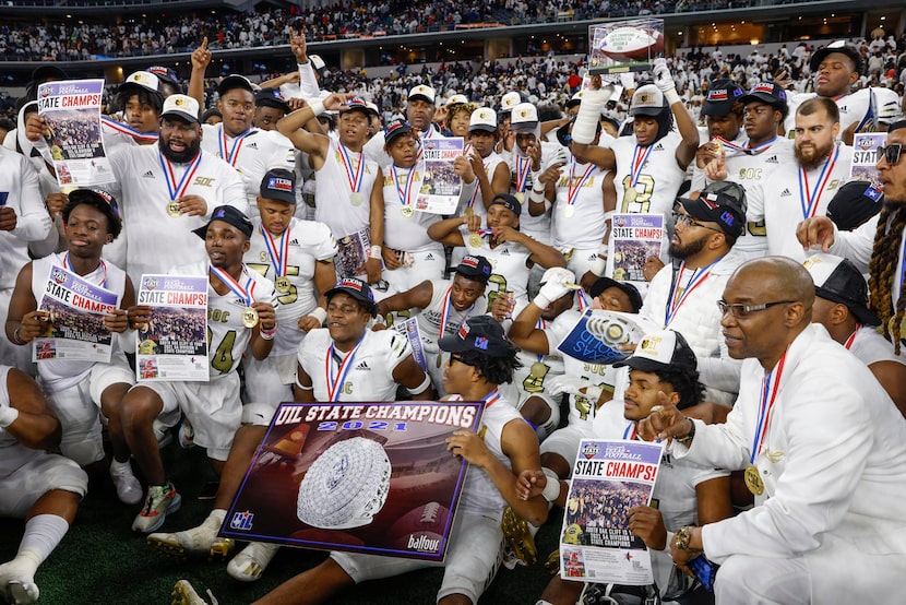 The South Oak Cliff team poses with their medals after winning the Class 5A Division II...