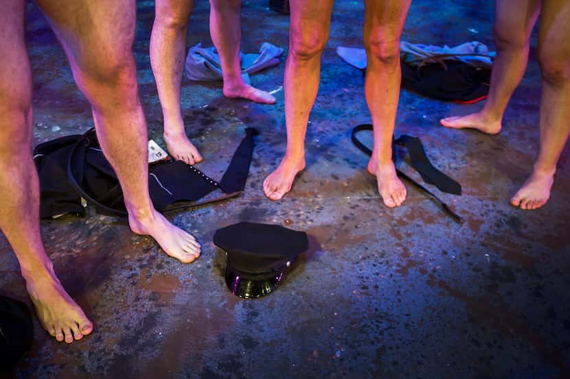 The legs of (from left) Michael Issac, Greg Hullett, Tom Grugle, and Brandon Wilhelm, as the...