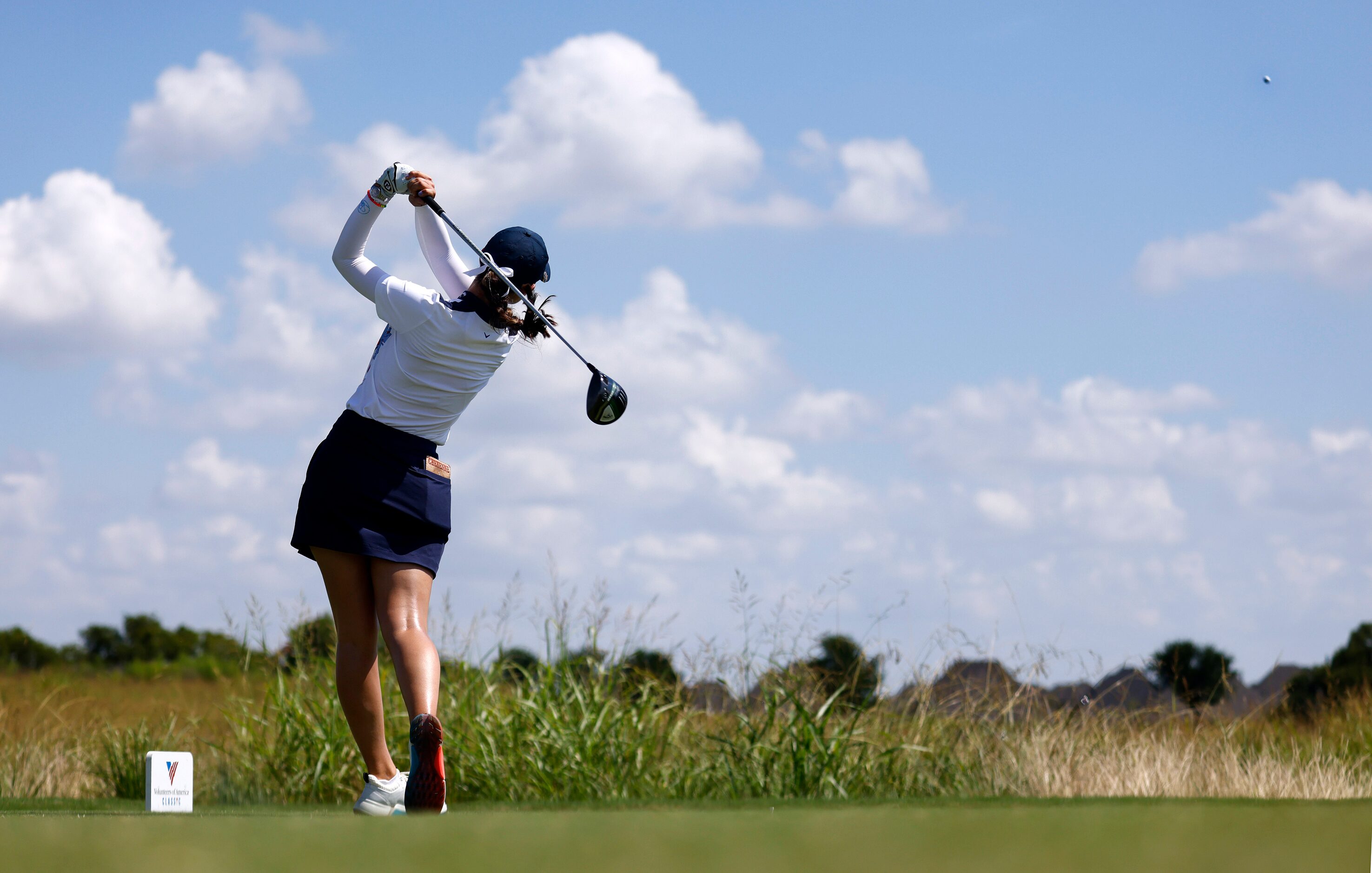 Professional golfer Cheyenne Knight of Aledo follows through on her drive on No. 1 during...