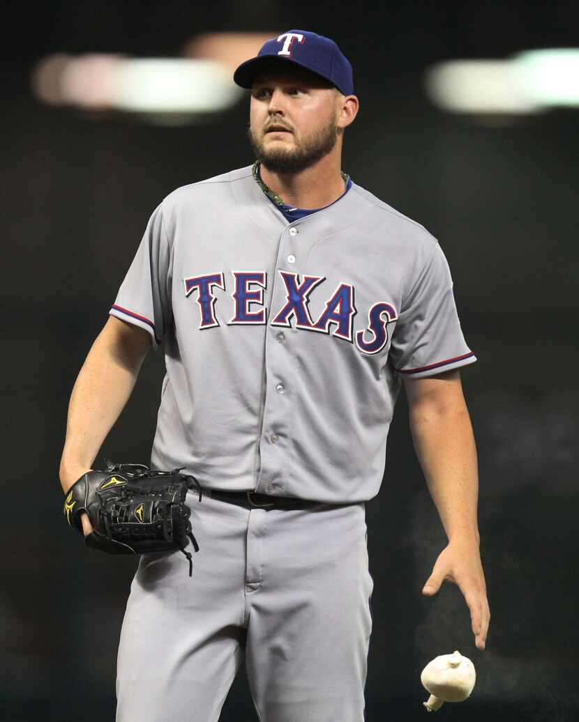 Texas starter Matt Harrison is pictured during the fifth inning during the Texas Rangers vs....
