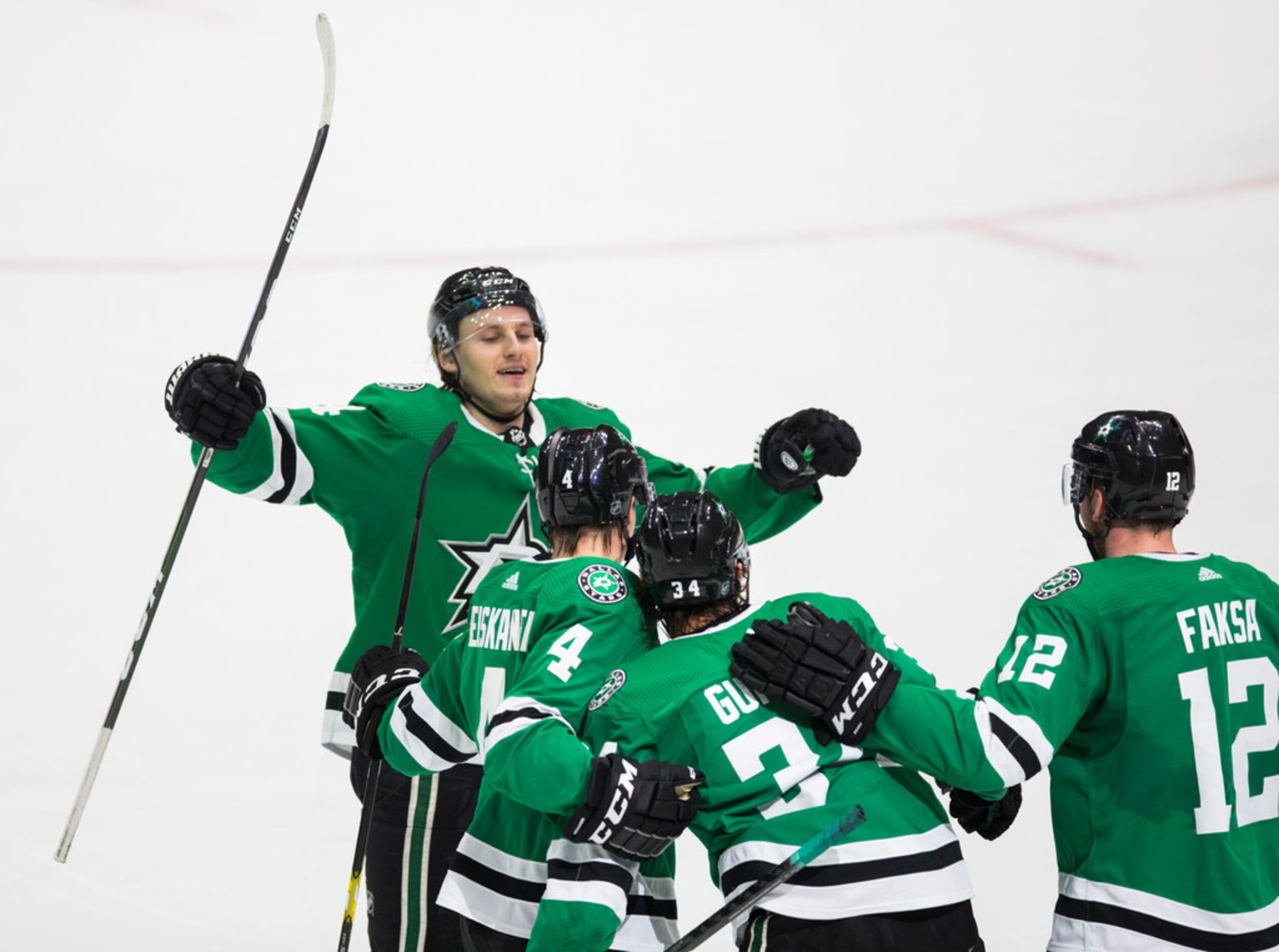 Dallas Stars celebrate a goal by Dallas Stars right wing Denis Gurianov (34) during the...