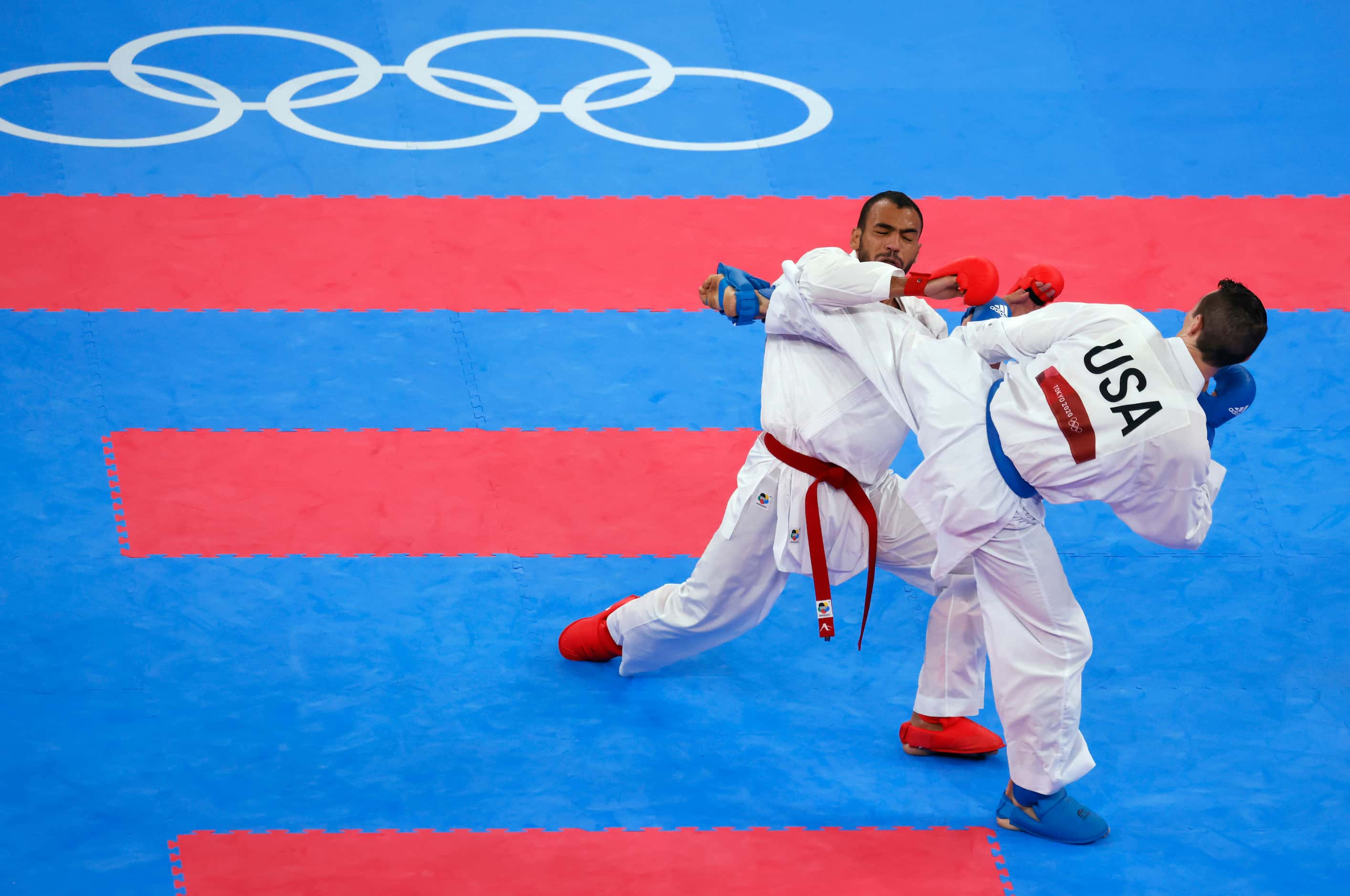 USA’s Tom Scott competes against Egypt’s Abdalla Abdelaziz during the karate men’s kumite...