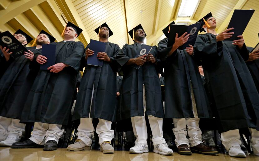  Inmates follow the May 9 commencement program of Southwestern Baptist Theological Seminary...