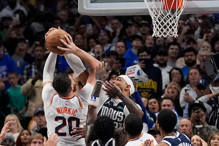 Phoenix Suns center Jusuf Nurkic (20) is fouled by Dallas Mavericks center Daniel Gafford...