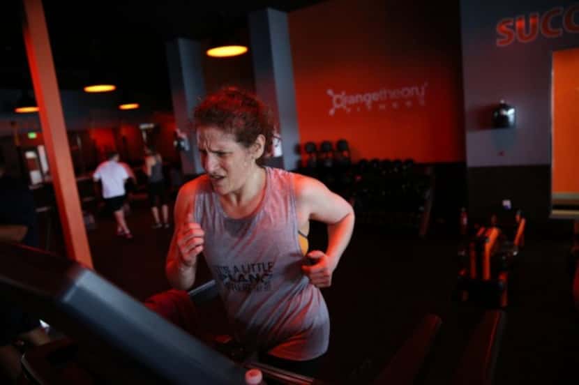  Meryl Evans, who was born deaf, found a way to work out almost daily at Orange-Theory...