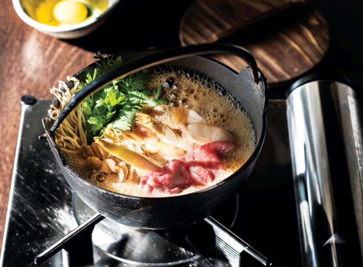 A5 Miyazaki Wagyu beef is featured in Teiichi Sakurai's country-style gyu nabe at Tei-An in...