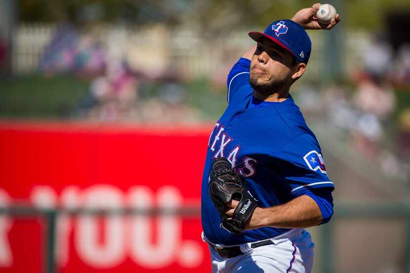 Texas Rangers pitcher Ricky Rodriguez pitches during the third inning of a spring training...