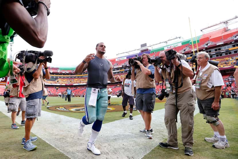 Dallas Cowboys quarterback Dak Prescott (4) exits the field after defeating the Washington...