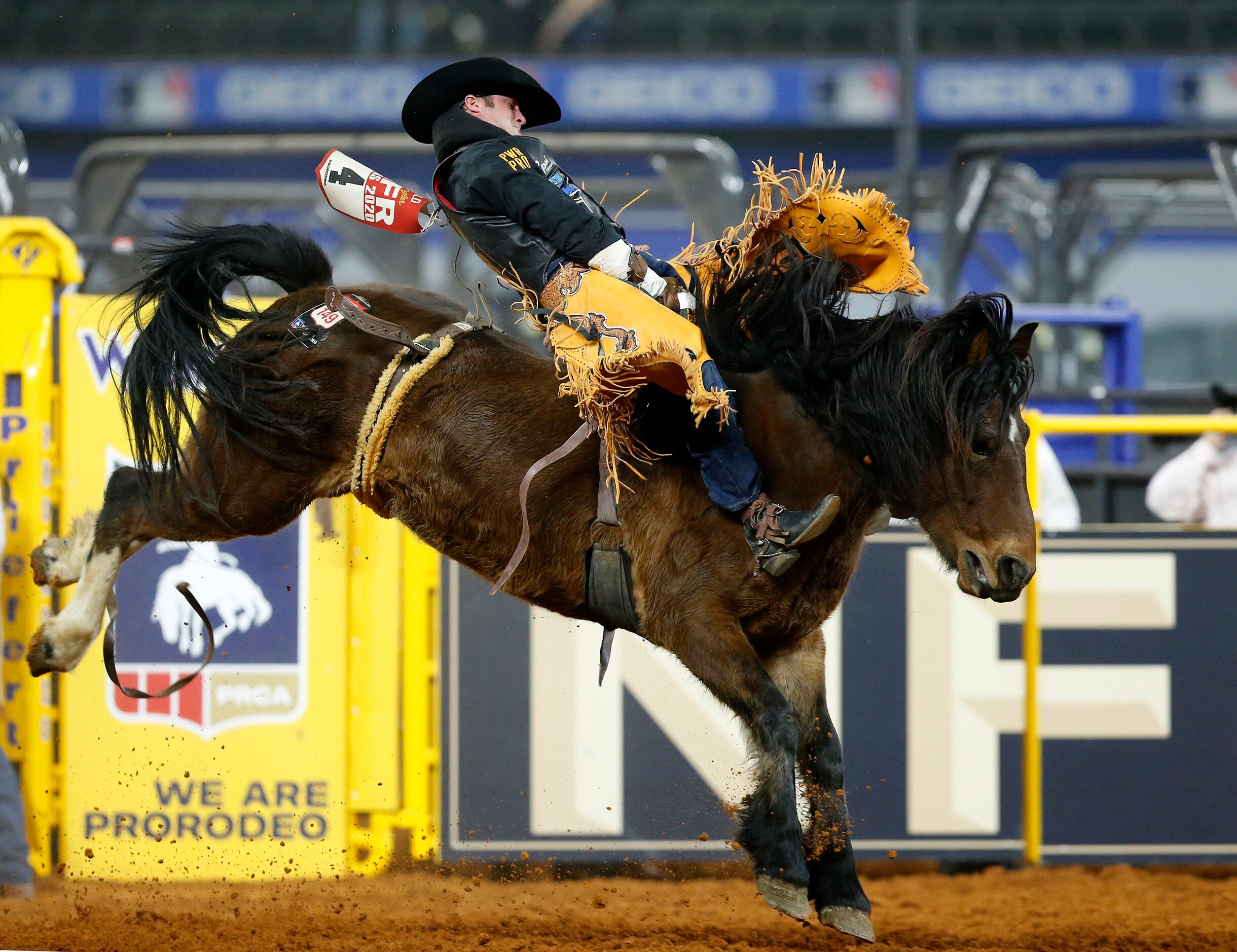 Bareback Riding Champion Kaycee Feild of Genola, Utah rides Straight Moonshine during Round...