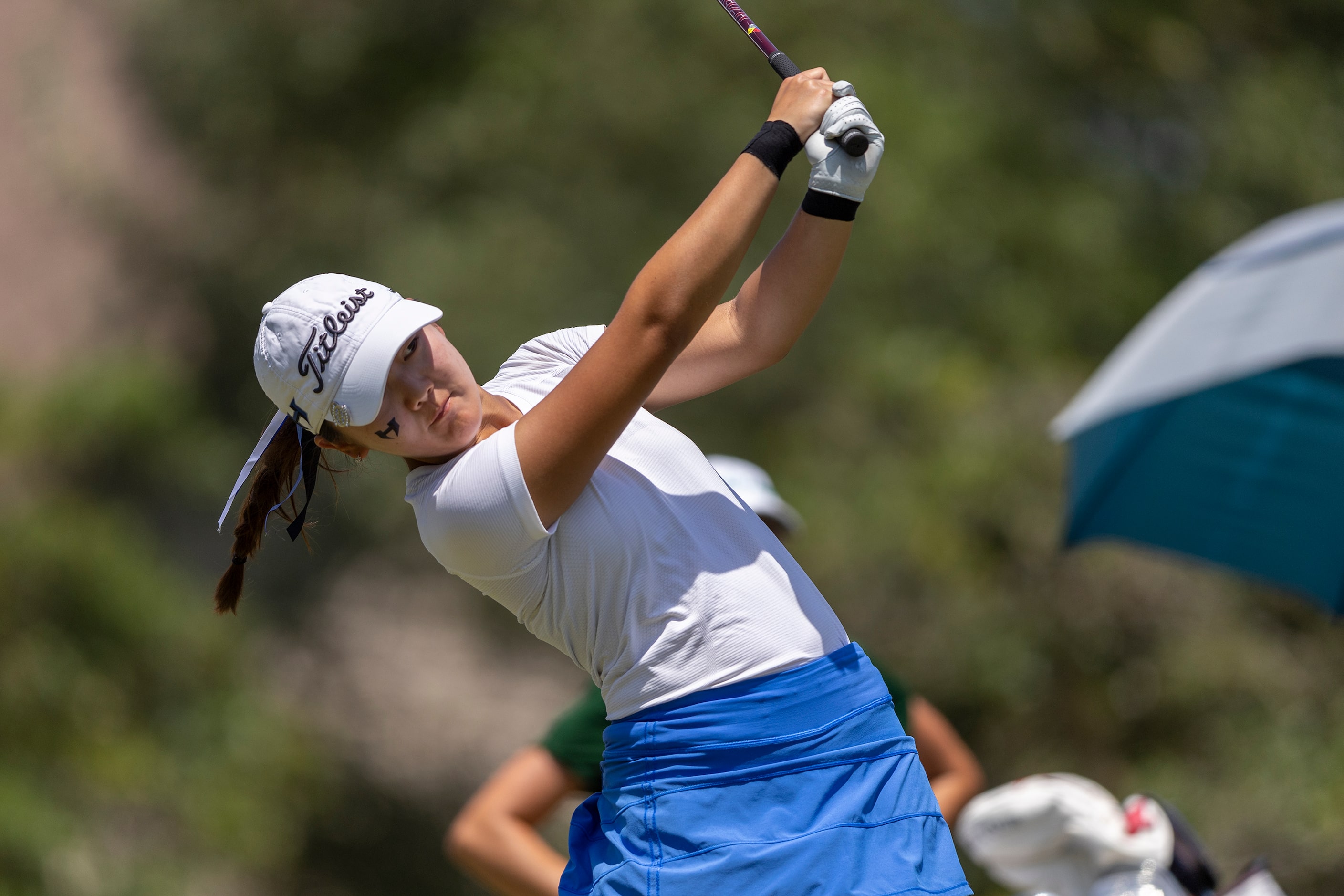 Hebron’s Estelle Seon hits from the 10th tee box during the 6A girls state golf tournament...