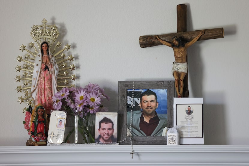 An altar on the memory of Carlos King, remain in the house of his brother, on Saturday, May...