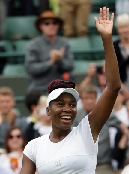 Venus Williams of the U.S celebrates after beating Carla Suarez Navarro of Spain in their...