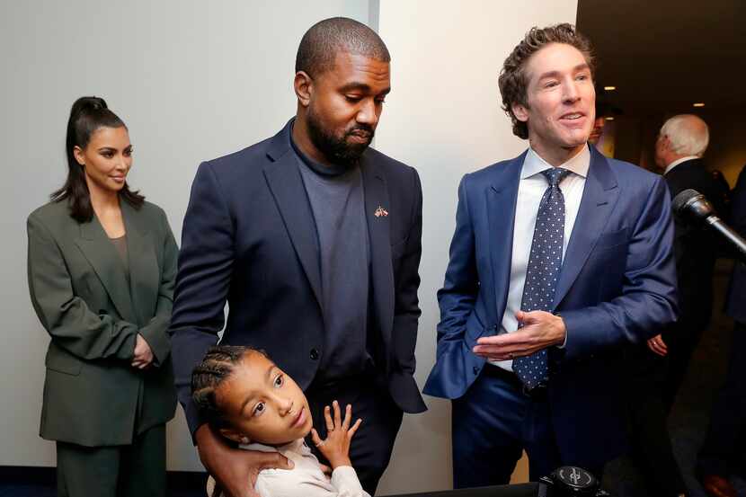 From left, Kim Kardashian West, North West, Kanye West and Joel Osteen answer questions...