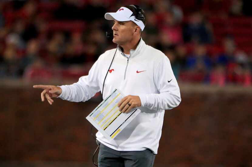 DALLAS, TX - OCTOBER 22:  Head coach Chad Morris of the Southern Methodist Mustangs leads...