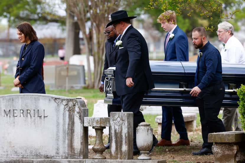 Pallbearers carry the casket of Paul Alexander during his burial service on Wednesday, March...