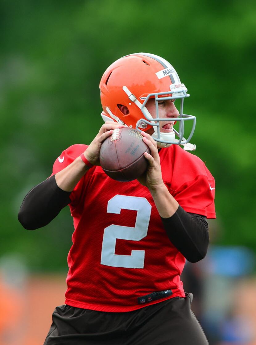May 28, 2014; Berea, OH, USA; Cleveland Browns quarterback Johnny Manziel (2) looks to pass...