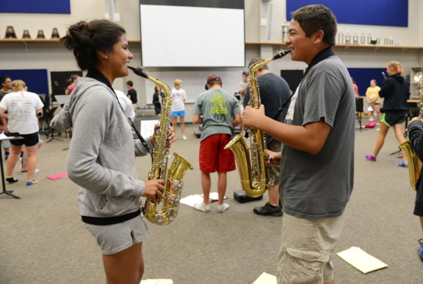 Melissa Goytia and Garrison Whadford practice in the new band hall at Wylie East High...