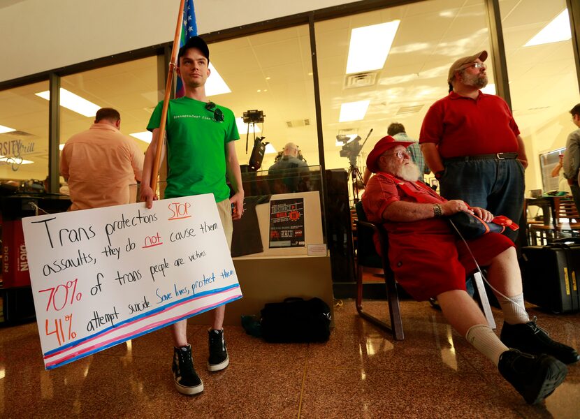 Adam Davies of Fort Worth (left, who doesn't support the policy) and retired FWISD teacher...