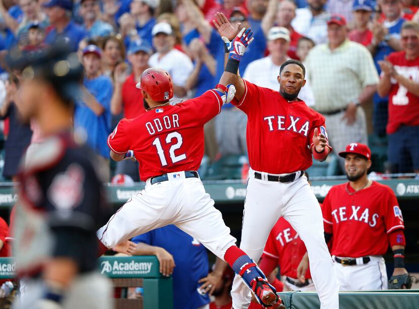 Texas Rangers second baseman Rougned Odor (12) celebrates with Texas Rangers shortstop Elvis...