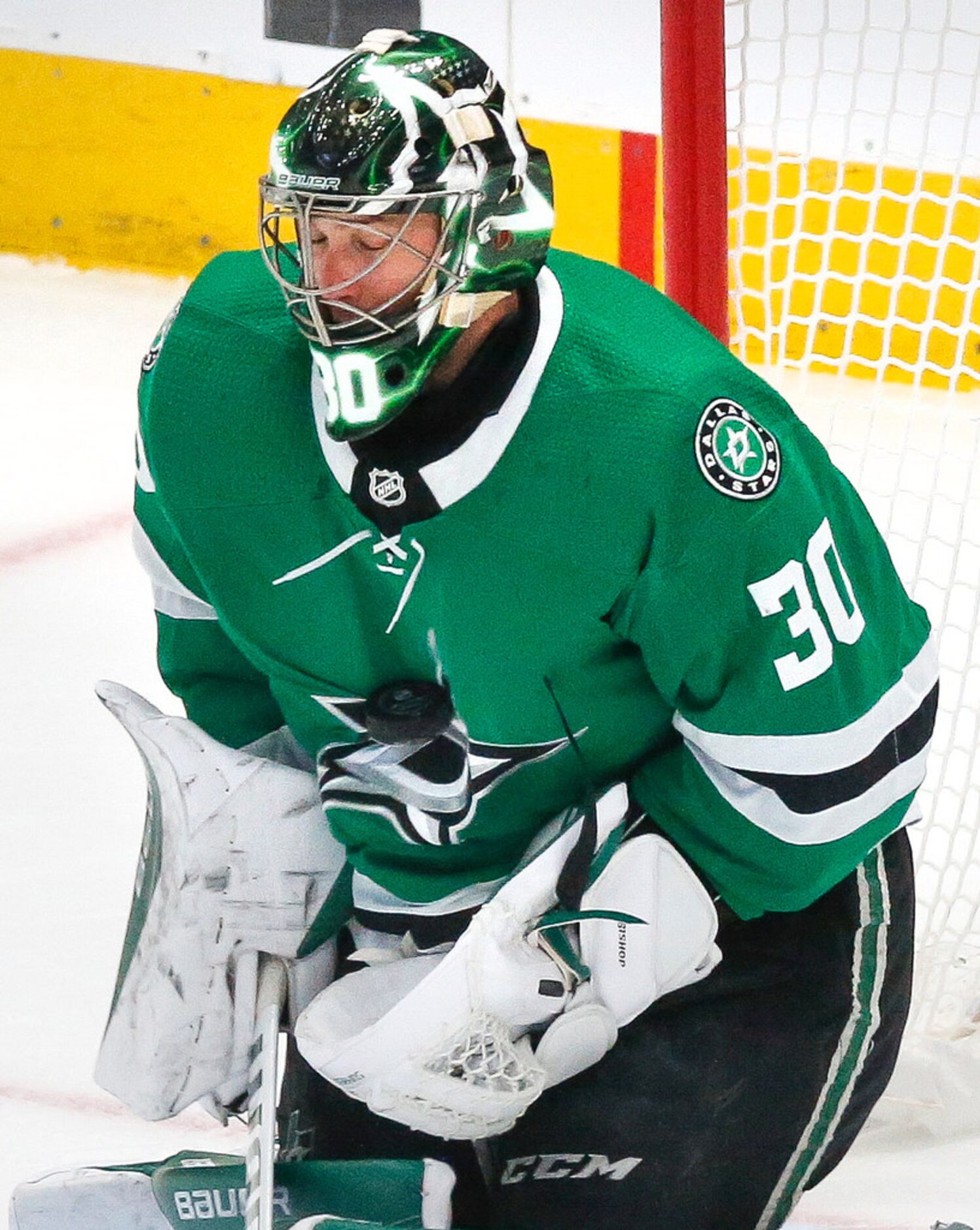 Dallas Stars goaltender Ben Bishop (30) blocks a shot during the first period of a NHL...