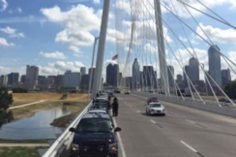  Sheriff's deputies lined the Margaret Hunt Hill Bridge west of downtown Dallas in honor of...