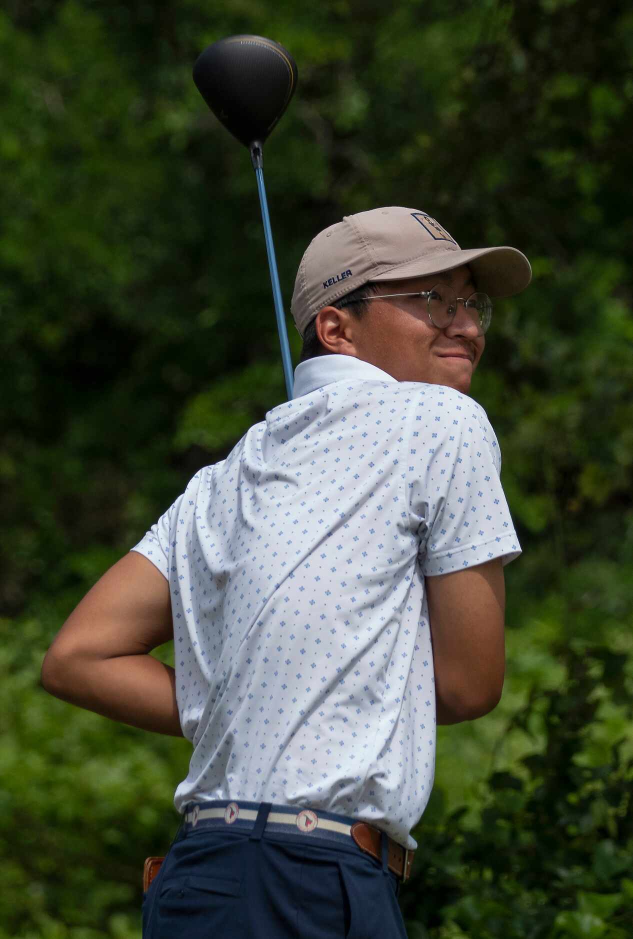 Keller Daniel Choi, reacts to his tees shot from the no.10 tee box during the UIL Class 6A...