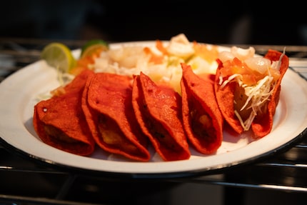 Los Primos Tacos & More's red taquitos, potato-filled tacos made in a red corn tortilla and...