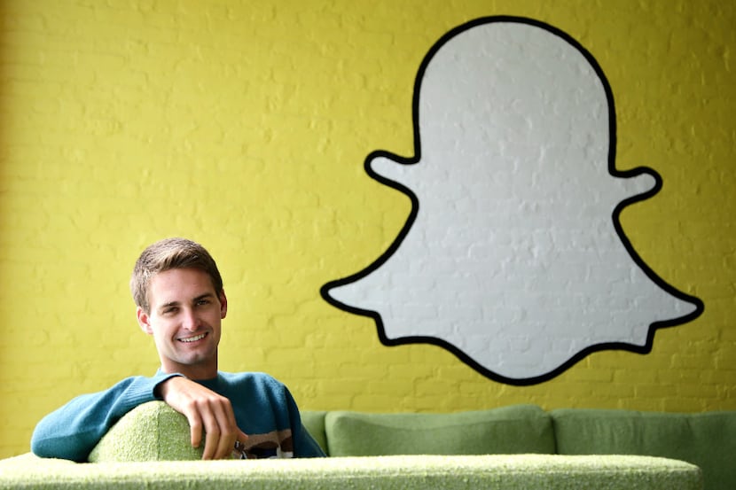 FILE - In this Thursday, Oct. 24, 2013, file photo, Snapchat CEO Evan Spiegel poses for a...
