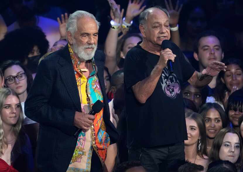 Tommy Chong, left, and Cheech Marin, of Cheech and Chong, present the global icon award at...