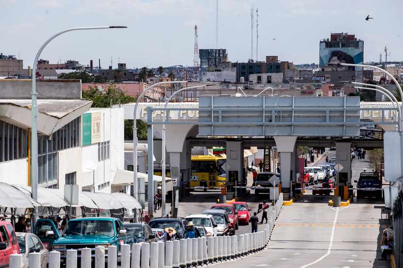 Vehicles wait in line to cross the border to El Paso, Texas, through the Paso Del Norte Port...