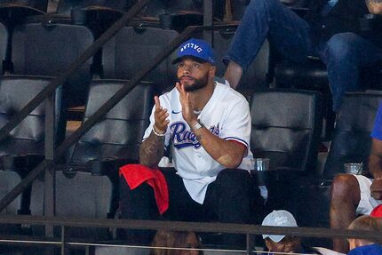 Dallas Cowboys quarterback Dak Prescott watches Game 5 of the American League Championship...