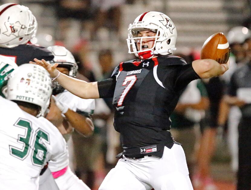 Lovejoy High School quarterback Carson Collins (7) throws a pass during the first half as...