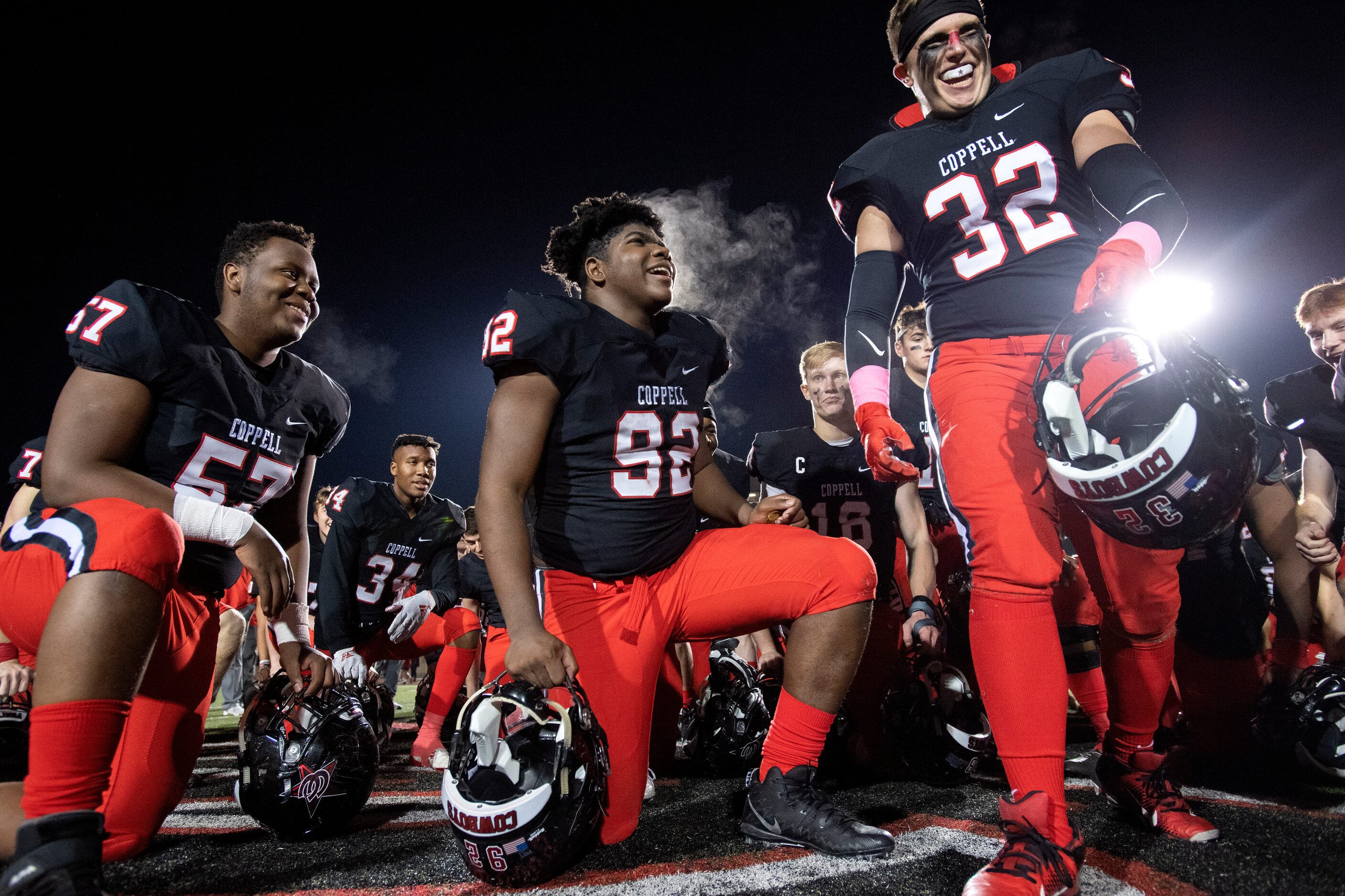 Steam rises from Coppell defensive linemen Ruzivo Masaisai (57) and Simi Ncube-Socks (92) as...