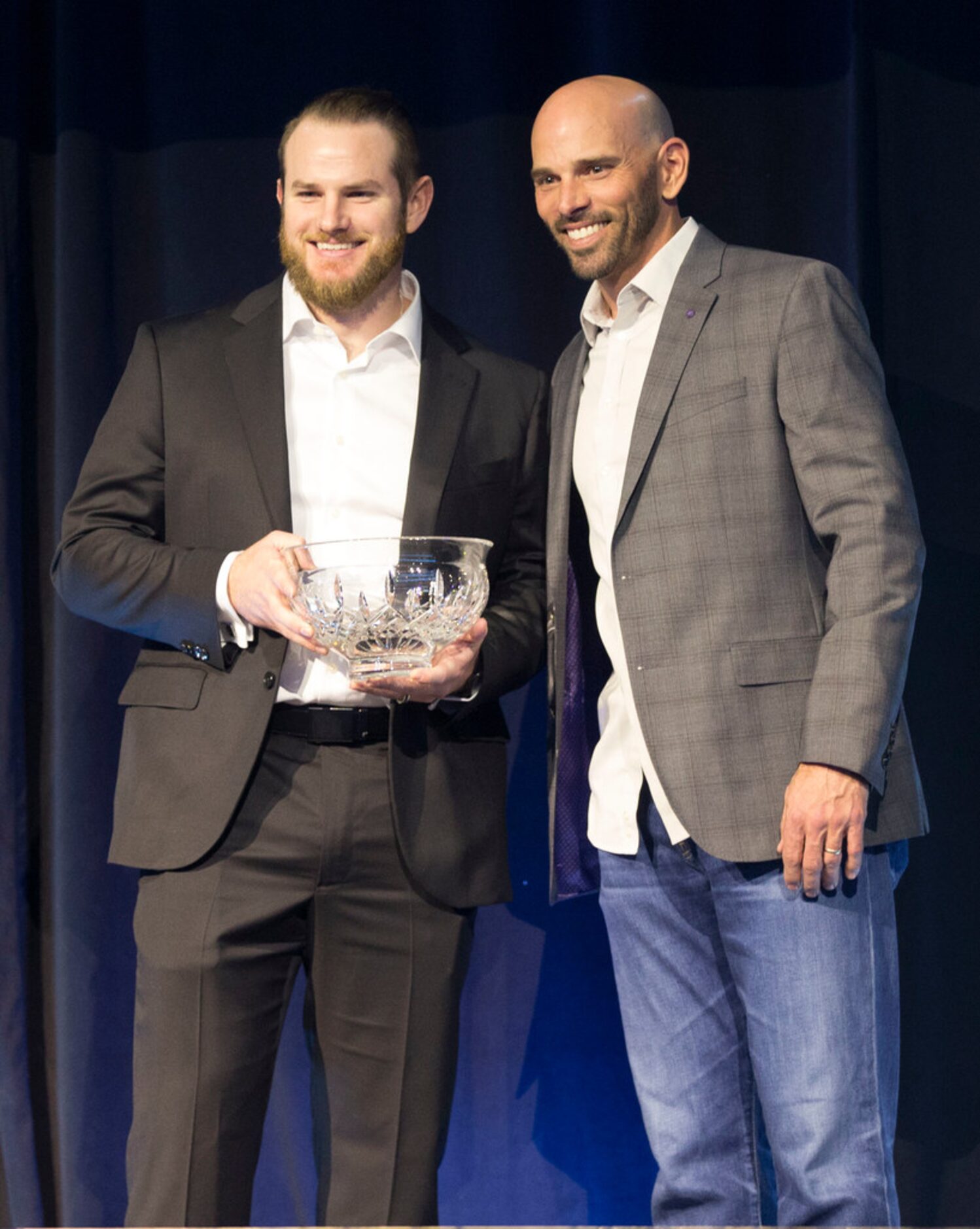 Max Muncy, Los Angeles Dodgers infielder, left, poses with Texas Rangers manager Chris...