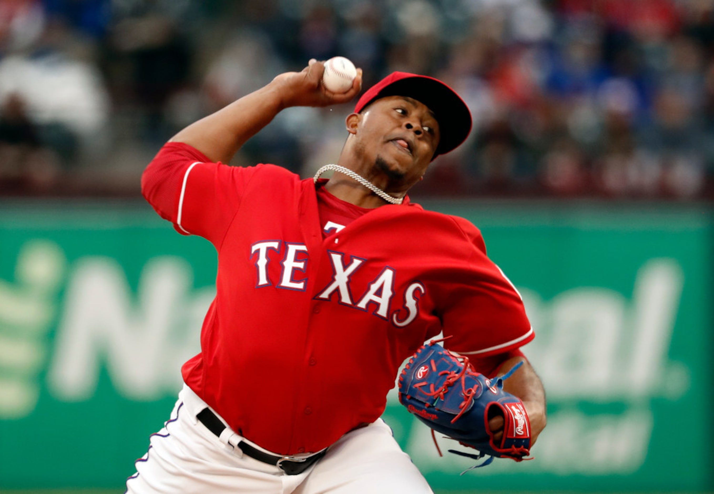 Texas Rangers starting pitcher Edinson Volquez throws to the Chicago Cubs in the first...