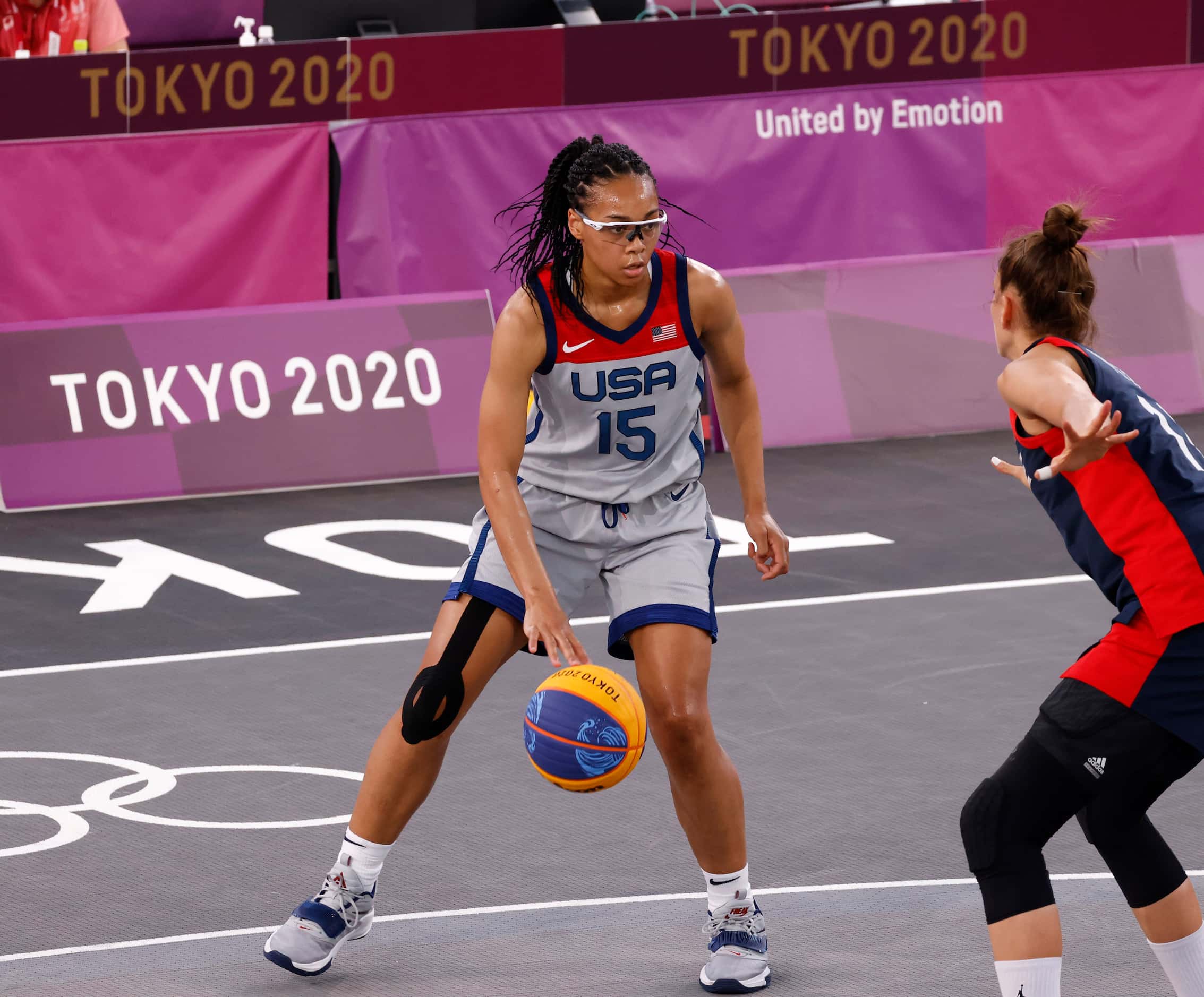 USA’s Allisha Gray (15) dribbles in front of France’s Ana Maria Filip (11) in a 3x3 women’s...