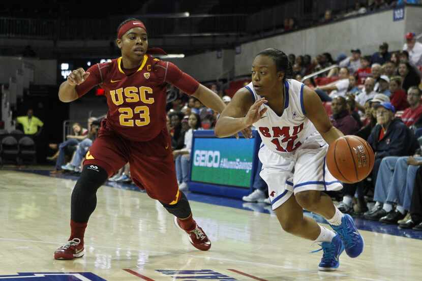 Southern Methodist Mustangs guard Morgan Bolton (12) drives to the basket while USC Trojans...
