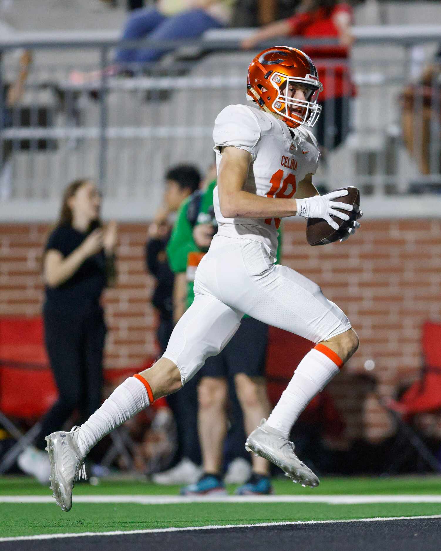 Celina wide receiver Brower Nickel (18) strides into the end zone for a touchdown during the...
